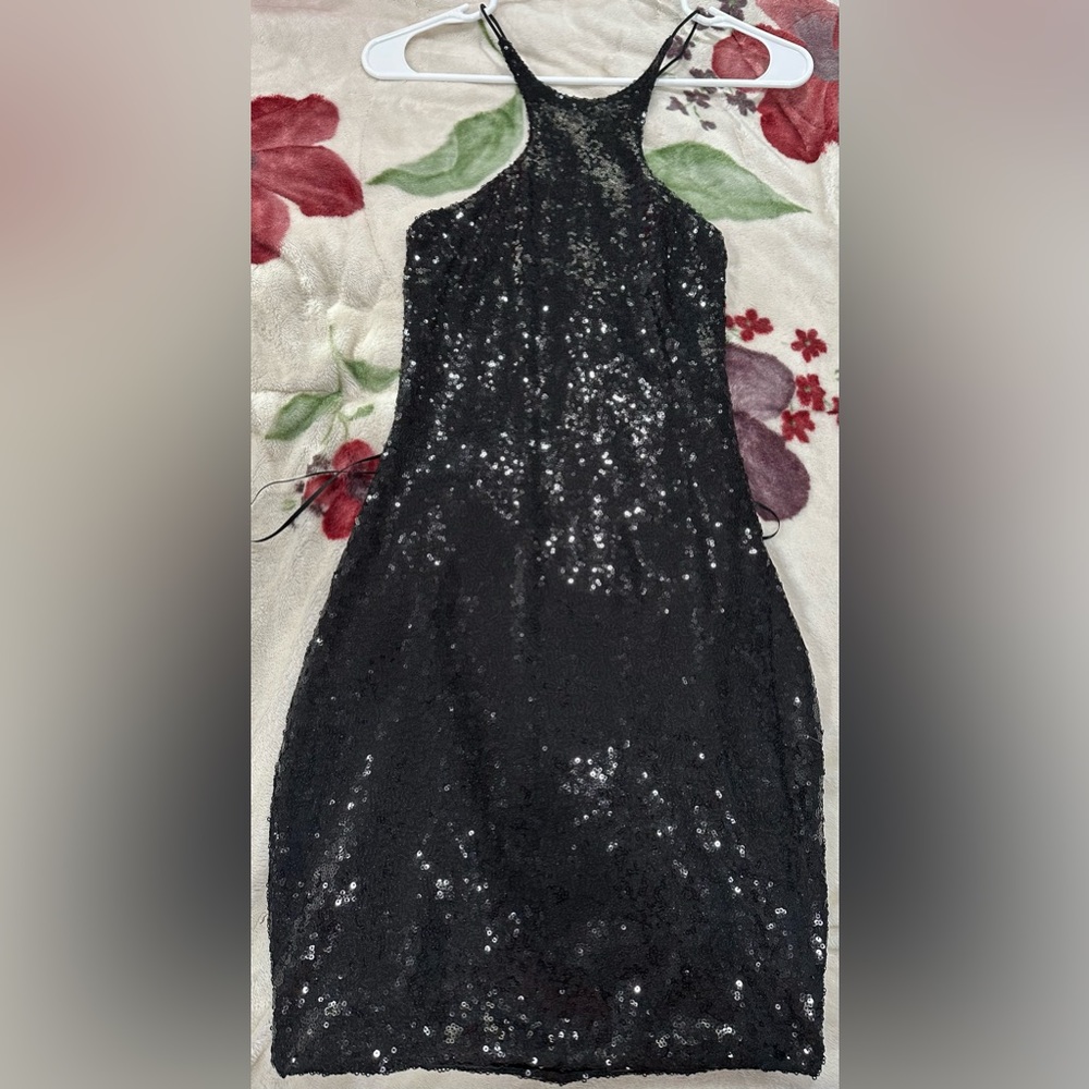 Dress is black, size small with back showing